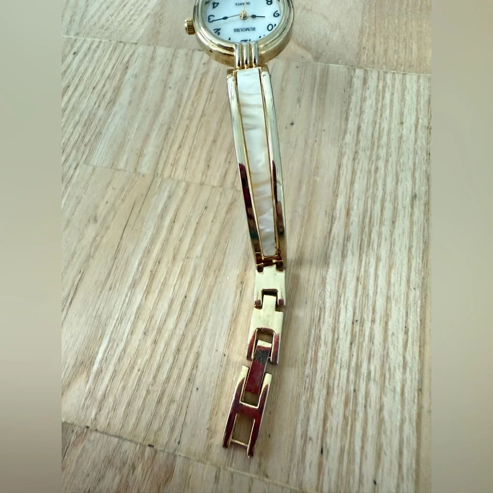 Rumours ladies gold tone watch NEW BATTERY